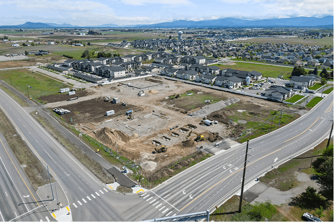 Construction site in works with trucks and machines.