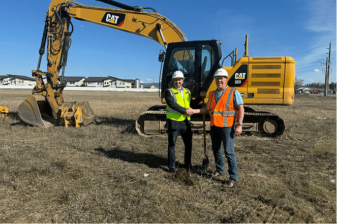 North Point Plaza construction workers shaking hands